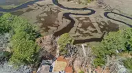 3223 Mullet Creek Place SE, Bolivia, NC 28422 — 3-bedroom waterfront home in River Run Plantation, Bolivia, NC, photo 7 of 61: DJI_20260321121508_0017_D