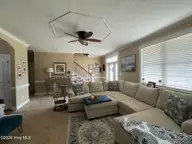 6725 Hemlock Court, Sims, NC 27880 — 4-bedroom home in Magnolia Place, Sims, NC, photo 8 of 58: family room
