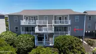 250 W Second Street 2b, Ocean Isle Beach, NC 28469 — 3-bedroom waterfront condo in Starboard by the Sea, Ocean Isle Beach, NC, photo 2 of 35: back of unit showing wich condo