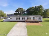 9929 Old Mill Road NE, Leland, NC 28451 — 4-bedroom manufactured home, Leland, NC, photo 1 of 33: 9929 Old Mill front
