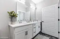 395 S Crow Creek Dr 1702, Calabash, NC 28467 — 3-bedroom condo in Crow Creek, Calabash, NC, photo 15 of 39: Primary Bath