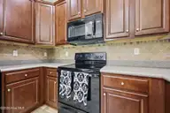 1295 Murrill Hill Road, Jacksonville, NC 28540 — 3-bedroom home in Evelyns Ridge, Jacksonville, NC, photo 10 of 45: 34-web-or-mls-1295 Murrill Hill Rd 77