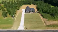 7451 Grover Road, Nashville, NC 27856 — 4-bedroom home in Whispering Pines, Nashville, NC, photo 3 of 65: 47-web-or-mls-DJI_20260917151446_0786_D-