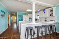 1025 W Beach Drive, Oak Island, NC 28465 — 3-bedroom waterfront home, Oak Island, NC, photo 12 of 45: 1025 W Beach 12