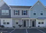 427 Sunfish Lane, Sneads Ferry, NC 28460 — 2-bedroom townhome in Beachside Commons, Sneads Ferry, NC, photo 1 of 27: 427 Sunfish Ln