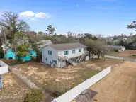 321 NE 59th Street, Oak Island, NC 28465 — 4-bedroom home, Oak Island, NC, photo 7 of 61: 4-web-or-mls-DJI_20260303105337_0824_D