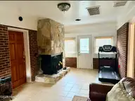 1210 Meadowood Drive, Kinston, NC 28501 — 4-bedroom home in Perry Park Extension, Kinston, NC, photo 10 of 41: Sunroom/bonus room
