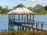 Lot 21r Shipyard Lane, Hampstead, NC 28443 — waterfront lot in Sloop Point Plantation, Hampstead, NC, photo 15 of 36: 34-web-or-mls-DJI_20250409115014_0147_D