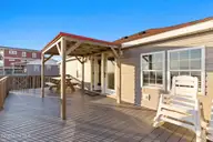 4025 E Beach Drive, Oak Island, NC 28465 — 3-bedroom waterfront home in Long Beach, Oak Island, NC, photo 10 of 40: 43-web-or-mls-CAMMediaLLC.com (43 of 47)