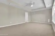6830 Fellowship Drive, Leland, NC 28451 — 5-bedroom home in Grand Park, Leland, NC, photo 16 of 49: Primary Bedroom