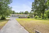 178 Cedarwood Drive, Swansboro, NC 28584 — 3-bedroom manufactured home in Cedar Creek Est, Swansboro, NC, photo 2 of 26: 2-web-or-mls-174-Cedarwood-6-29-26-001