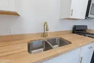316 E Walter Street, Whiteville, NC 28472 — 3-bedroom home, Whiteville, NC, photo 19 of 42: Large Sink and pretty gold faucet!