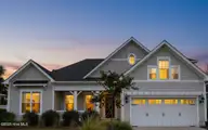 6391 Bryson Drive SW, Ocean Isle Beach, NC 28469 — 4-bedroom home in Retreat At OIB, Ocean Isle Beach, NC, photo 2 of 71: Dusk front of house