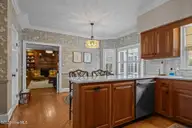 2707 E Fairway Road, Morehead City, NC 28557 — 4-bedroom home in Country Club East, Morehead City, NC, photo 16 of 61: Kitchen view into Family room
