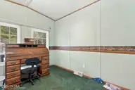 42 Warwick Court, Hampstead, NC 28443 — 3-bedroom manufactured home in Groves Point, Hampstead, NC, photo 19 of 55: Office with AI