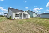 174 Planters Walk, Hampstead, NC 28443 — 4-bedroom waterfront home in East Wynd, Hampstead, NC, photo 24 of 32: Backyard 2