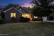 312 Wendover Lane, Wilmington, NC 28411 — 3-bedroom home in Wendover, Wilmington, NC, photo 3 of 35: Front - Twilight