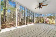 501 Deer Path, Calabash, NC 28467 — 2-bedroom home in Saltaire Village, Calabash, NC, photo 4 of 57: Screened Porch