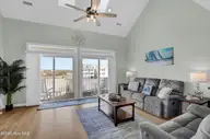 3809 Island Drive, North Topsail Beach, NC 28460 — 4-bedroom waterfront townhome in Sea Oaks, North Topsail Beach, NC, photo 9 of 47: Living Room, Second Level