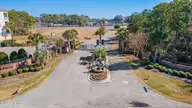 2252 Dolphin Shores Drive SW Unit 6, Supply, NC 28462 — 3-bedroom waterfront condo in Dolphin Shores, Supply, NC, photo 3 of 48: 1_jms_drone31.1
