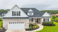 1005 Layne Court NE, Leland, NC 28451 — 4-bedroom waterfront home in Waterford of the Carolinas, Leland, NC, photo 1 of 73
