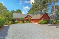 121 Lakeview Point, West End, NC 27376 — 3-bedroom waterfront home in Seven Lakes North, West End, NC, photo 2 of 65: front2-1