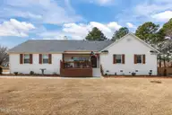100 Stevens Court, Swansboro, NC 28584 — 3-bedroom waterfront home in River Reach, Swansboro, NC, photo 6 of 56: Front View