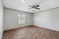 108 Cole Porter Lane, Jacksonville, NC 28540 — 4-bedroom manufactured home in Porters Ridge, Jacksonville, NC, photo 14 of 35: Primary Bedroom
