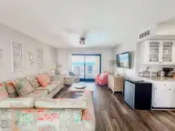 1505 Salter Path Road 325, Indian Beach, NC 28512 — 4-bedroom waterfront condo in Summer Winds Condominiums, Indian Beach, NC, photo 2 of 46: Living Room