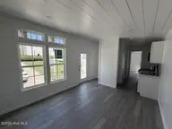 1580 Breezeway Drive SW, Ocean Isle Beach, NC 28469 — 2-bedroom home in Ocean Aire Estates, Ocean Isle Beach, NC, photo 5 of 19: Living Area