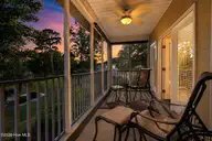 107 Crooked Gulley Circle Apt 4, Sunset Beach, NC 28468 — 3-bedroom condo in Sea Trail Plantation, Sunset Beach, NC, photo 23 of 28: porch view