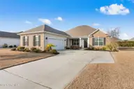 1208 Fence Post Lane, Carolina Shores, NC 28467 — 4-bedroom home in The Farm, Carolina Shores, NC, photo 1 of 40: Front