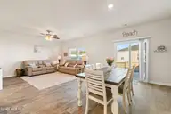 1068 Tripletail Drive NW, Sunset Beach, NC 28468 — 3-bedroom home in Sunfish Cove, Sunset Beach, NC, photo 11 of 33: Dining/Living