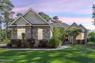 707 N Green Tee Road, Hampstead, NC 28443 — 3-bedroom waterfront home in Olde Point, Hampstead, NC, photo 1 of 62: 1_virtual twilight
