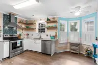 124 NE 15th Street, Oak Island, NC 28465 — 3-bedroom home in Long Beach, Oak Island, NC, photo 10 of 51: thumbnail-0196a7bd-0442-7229-b1a5-7e284f