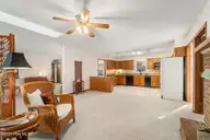 175 Cedar Lane, Newport, NC 28570 — 3-bedroom home in Gull Harbor, Newport, NC, photo 6 of 30: family room 2 to kitchen 2