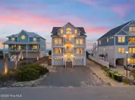 31 Porpoise Place, North Topsail Beach, NC 28460 — 7-bedroom waterfront home in Dolphin Shores, North Topsail Beach, NC, photo 1 of 71