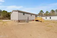 6745 Lewis Drive SE, Winnabow, NC 28479 — 3-bedroom manufactured home in Lewis Acres, Winnabow, NC, photo 4 of 28: 6745 Lewis Dr
