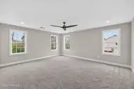 9575 Lily Pond Court NE, Leland, NC 28451 — 4-bedroom home in Lily Pond, Leland, NC, photo 20 of 37: Primary bedroom