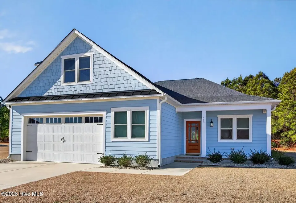 460 Summerhouse Drive, Holly Ridge, NC 28445 — 4-bedroom home in Summerhouse On Everett Bay, Holly Ridge, NC, photo 1 of 73: front porch