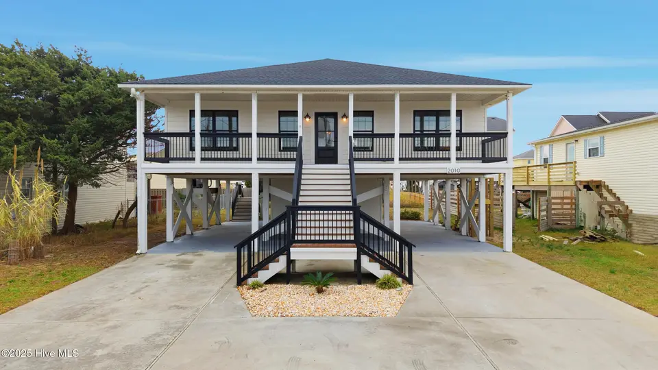2010 N New River Drive, Surf City, NC 28445 — 3-bedroom home in Old Settlers Beach, Surf City, NC, photo 1 of 49: 1_dji_20251121103904_0053_d