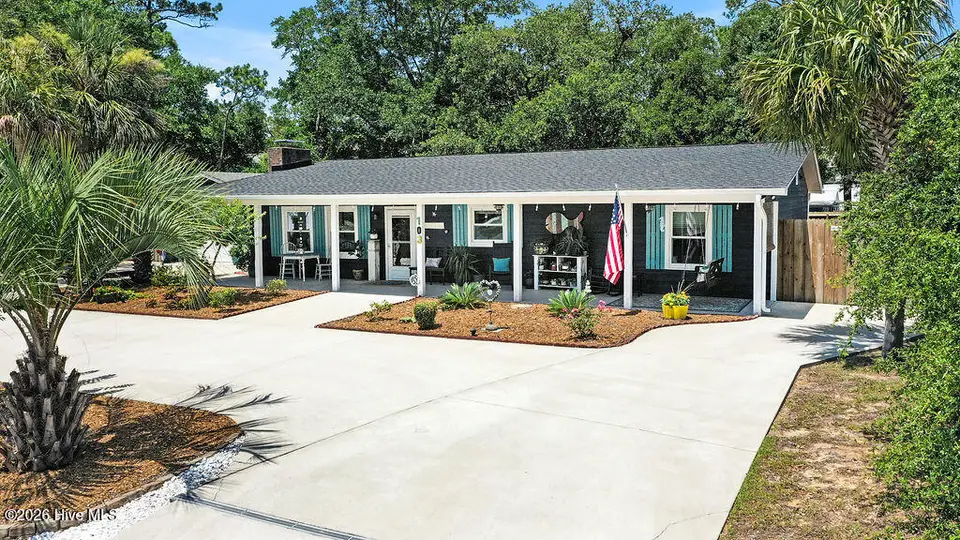 103 NW 25th Street, Oak Island, NC 28465 — 3-bedroom home in Pinners Point, Oak Island, NC, photo 1 of 53