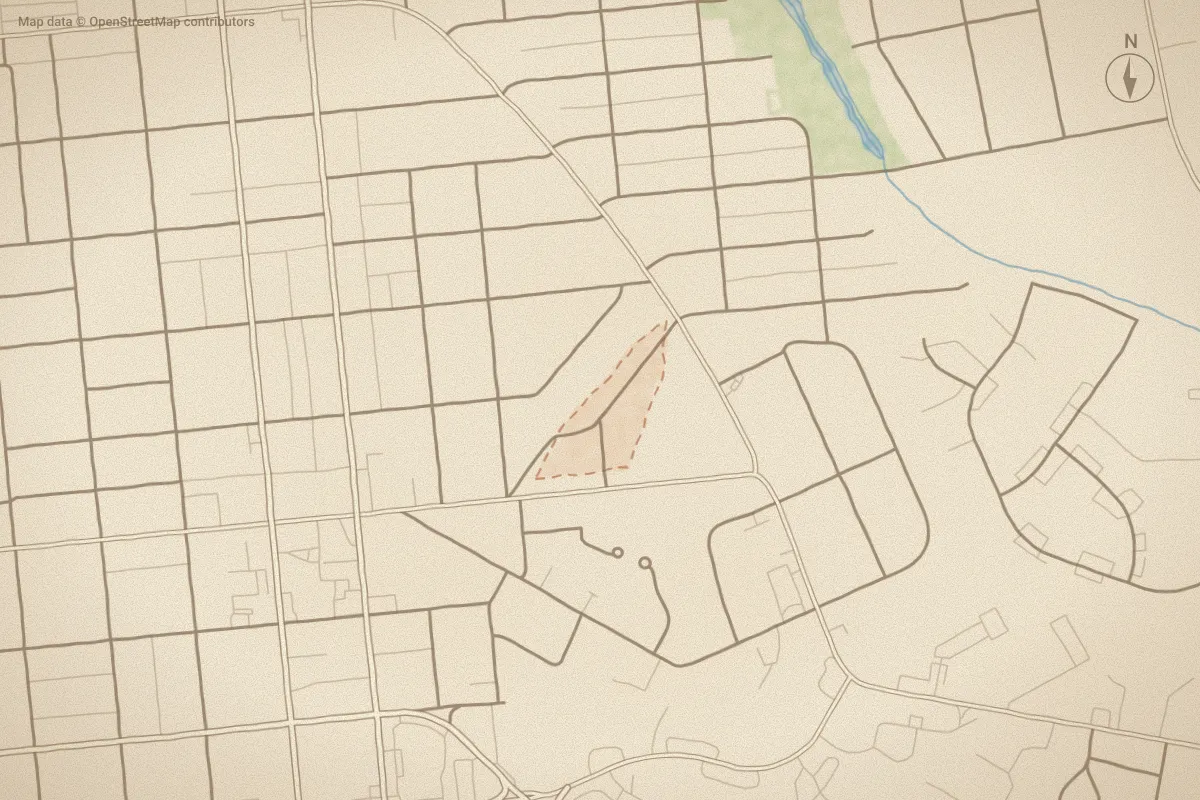 Watercolor map of Manhattan in Wilmington, NC, showing its streets, water and surroundings
