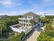 101 Jackson Avenue, Emerald Isle, NC 28594 — 4-bedroom waterfront home in Jefferson Place, Emerald Isle, NC, photo 1 of 61: 101 Jackson Ave