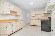 1709 W Wilson Street, Tarboro, NC 27886 — 3-bedroom home, Tarboro, NC, photo 11 of 26: Eat-In Kitchen
