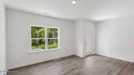 246 Maddox Drive, Aberdeen, NC 28315 — 3-bedroom townhome in Martin Farms, Aberdeen, NC, photo 8 of 25: LIVING ROOM AND DINING ROOM