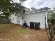 165 Pecan Lane, Aberdeen, NC 28315 — 4-bedroom home in Woodgreen, Aberdeen, NC, photo 4 of 9: left side
