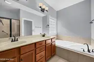 1245 Lillibridge Drive, Leland, NC 28451 — 4-bedroom home in Brunswick Forest, Leland, NC, photo 14 of 32: Owner's Bathroom