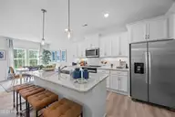 407 Loggerhead Boulevard, Surf City, NC 28445 — 3-bedroom home in Turtle Creek, Surf City, NC, photo 5 of 19: Pebble Kitchen