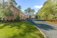 18 Whithorn Court, Pinehurst, NC 28374 — 4-bedroom home in Pinewild CC, Pinehurst, NC, photo 2 of 58: 261014-18WhithornCt-6940
